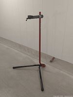 Full view of folding tripod bicycle stand