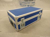 Top/side view of blue road case showing latches and trim