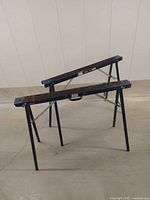 Both sawhorses opened and standing