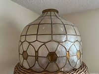 Full view of capiz shell lampshade showing overall design