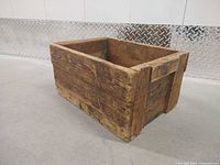 Angled view of crate showing front, side and interior