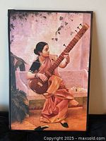 Front view of framed reproduction print showing artwork, frame edges and overall condition