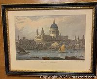 Front view of framed lithograph showing artwork and frame style