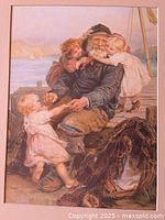 Close-up of lithograph print with mat showing fisherman and children scene