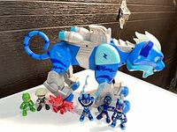 Front view of robotic cat and all five figures lined up