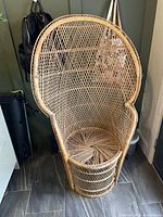 Front view of wicker rattan peacock chair showing full structure