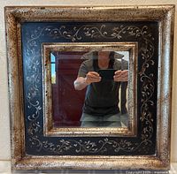 Front view of square mirror showing full frame, inner scroll design and beveled glass