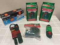 All six packaged electrical items displayed together