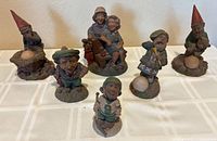 Group shot of all six Tom Clark gnome figurines