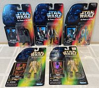 Group shot of five sealed Kenner Star Wars Power of the Force figures