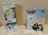 Both boxed Wii accessories side by side