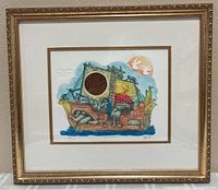 Full view of framed etching showing image, mat, and ornate gold frame