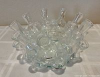 Top-angled view showing 18 fused bud vases and overall shape