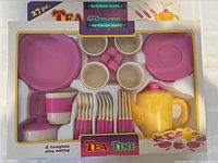 Front of sealed Kitchen-Mate Tea Time set showing contents and branding