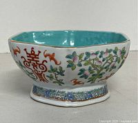 Side view showing exterior decoration of Shou character and floral branches