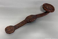 Overall view of carved wooden ruyi scepter