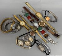 Group shot of all wristwatches and loose cases