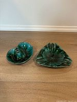 Both ashtrays side by side to show overall design and relative size