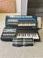 Keyboard, box and manual displayed together