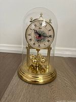 Full view of anniversary clock with dome in place