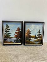 Both framed Richard Karon paintings side by side