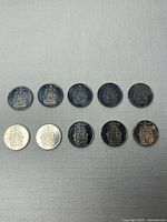 Group of ten 2002 Canada 50-cent coins, obverse side down