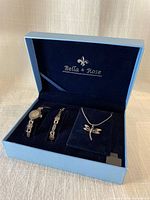 Open presentation box showing watch, bracelet, necklace