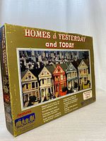 Front view of boxed HO scale building kit showing artwork and title