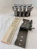 TTC transfer cutter, McGill coin dispenser front view with TTC transfer ticket