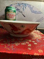 Side view showing dragon decoration and size reference