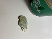 Front view of jade/nephrite bat pendant