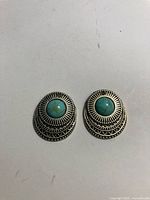 Front view of both earring drops showing cabochons and design