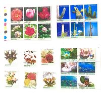 All five Angola miniature stamp sheets displayed together