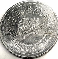 Obverse with mascots Hans and Frida, legends and denomination