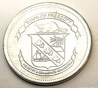 Obverse of token showing Town of Prescott arms and beaver