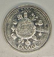 Reverse of 2000 Canada community quarter showing globe and symbols