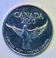 Obverse of 2000 Canada Post Millennium token showing dove and CANADA 2000 legend
