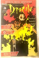 Front view of sealed Dracula #4 comic showing cover art and polybag note of 4 exclusive cards