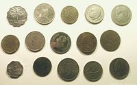 All fifteen coins laid out in three rows showing obverse designs