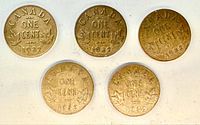 Five Canada 1932 one cent coins, reverse side showing ONE CENT and date