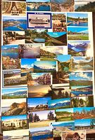 All postcards laid out showing fronts with various Western Canada images