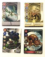 Fronts of four Bakugan Gate Cards showing artwork and stats