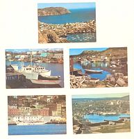 Front views of five photographic postcards showing coastal and city scenes