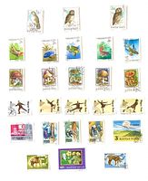 First album page showing birds, fish, mushrooms, sports and assorted commemoratives