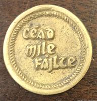 Obverse showing legend and border