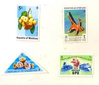 Overview of four Maldives stamps laid out