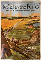 Front dust jacket showing title, subtitle, author, artwork, visible tear