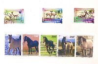 Full view of nine Niger stamps: three addax antelope and six horse series
