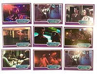 Front view of all nine Saturday Night Fever trading cards in three-by-three layout