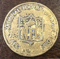 Obverse showing NFL shield logo and NATIONAL FOOTBALL LEAGUE AFC NFC 1998 legend